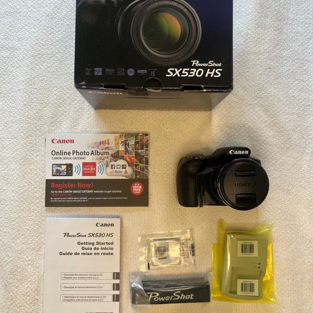 Canon Black Digital Camera with Large Zoom Lens and Textured Grip